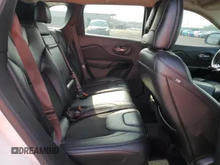 2019 Jeep Cherokee Altitude z VIN 1C4PJLLB7KD286063, wystawiony jako Copart lot #55282685 z przebiegiem 128 660 mil mil oraz Szkoda całkowita • Salvage title. Historia ofert i sprzedaży dostępna na DreamBid. Obrazek 11.