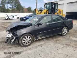 2002 Toyota Camry XLE z VIN JTDBF30K020016650, wystawiony jako Copart lot #51649515 z przebiegiem 265 407 mil mil oraz Szkoda całkowita • Salvage title. Historia ofert i sprzedaży dostępna na DreamBid. Obrazek 1.