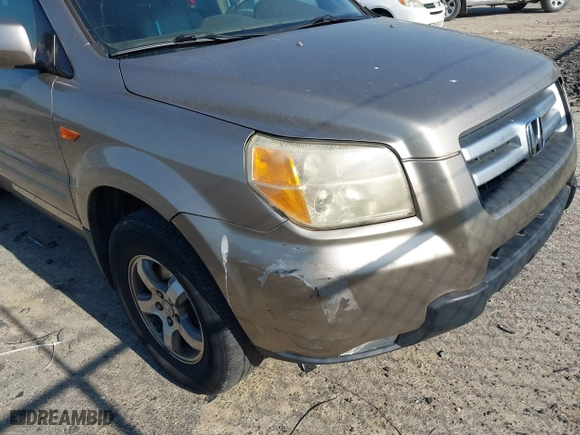 2006 Honda Pilot EX-L with RES with VIN 2HKYF186X6H525613, listed as a IAAI auction lot 42077659 with 171,124 mi miles. Bid and sale history available at carsss.com. Image 6.