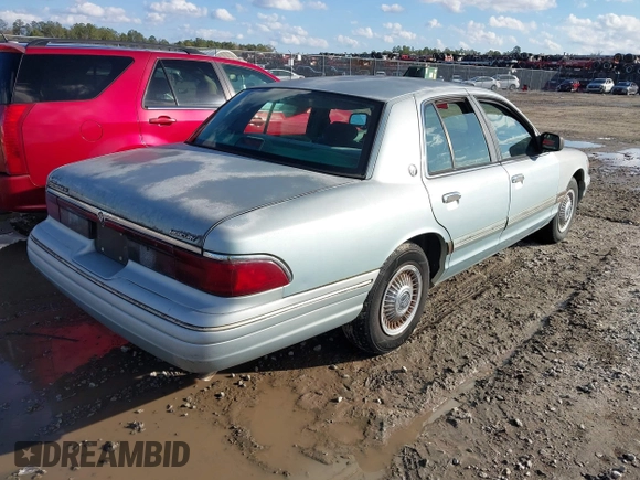 1996 Mercury Grand Marquis GS with VIN 2MELM74W7TX616694, listed as a IAAI auction lot 41216582 with 127,486 mi miles and . Bid and sale history available at DreamBid. Image 4.