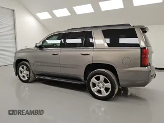 2019 Chevrolet Tahoe LT with VIN 1GNSCBKC0KR100687, listed as a Copart auction lot 53123455 with 104,006 mi miles and Clean title. Bid and sale history available at DreamBid. Image 2.