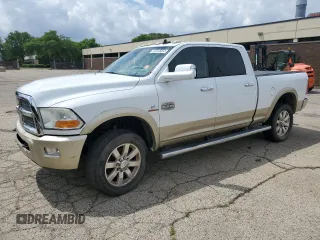 2014 Ram 2500 Longhorn с VIN 3C6UR5GL6EG266122, выставлен на аукционе Copart как лот 63589145 с пробегом 70 571 миль миль и Чистый • Clean title. История ставок и продаж доступна на DreamBid. Изображение 1.