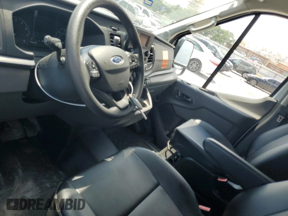 2023 Ford Transit Cargo z VIN 1FTBR1C81PKB53460, wystawiony jako Copart lot #60905465 z przebiegiem 35 658 mil mil oraz Czysty tytuł • Clean title. Historia ofert i sprzedaży dostępna na DreamBid. Obrazek 8.