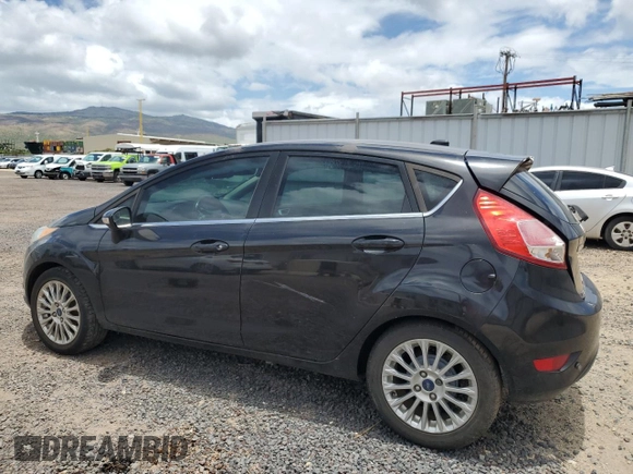 2014 Ford Fiesta Titanium z VIN 3FADP4FJXEM228098, wystawiony jako Copart lot #55173975 z przebiegiem 109 311 mil mil oraz Szkoda całkowita • Salvage title. Historia ofert i sprzedaży dostępna na DreamBid. Obrazek 2.