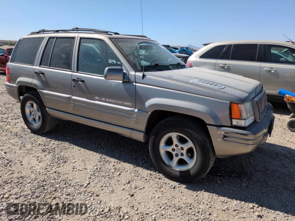 1998 Jeep Grand Cherokee Limited z VIN 1J4GZ88Z8WC306919, wystawiony jako Copart lot #61505725 z przebiegiem 195 329 mil mil oraz Czysty tytuł • Clean title. Historia ofert i sprzedaży dostępna na DreamBid. Obrazek 4.