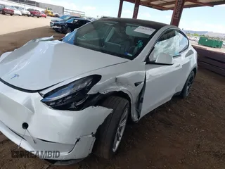 2021 Tesla Model Y Long Range with VIN 5YJYGAEE9MF254113, listed as a IAAI auction lot 42045256 with Not Provided miles. Bid and sale history available at carsss.com. Image 6.