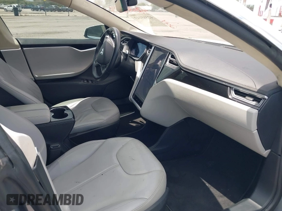 2014 Tesla Model S 60 with VIN 5YJSA1H12EFP39582, listed as a IAAI auction lot 42545143 with 117,383 mi miles and . Bid and sale history available at DreamBid. Image 5.