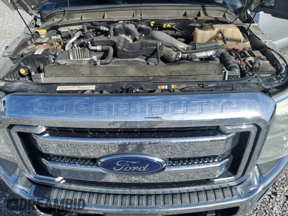 2012 Ford F-350 XL with VIN 1FT8W3BT1CEC94171, listed as a Copart auction lot 54445775 with 148,435 mi miles and Salvage title. Bid and sale history available at DreamBid. Image 11.