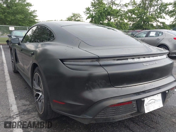 2021 Porsche Taycan 4S z VIN WP0AB2Y13MSA43638, wystawiony jako IAAI lot #42638298 z przebiegiem 27 634 mil mil oraz . Historia ofert i sprzedaży dostępna na DreamBid. Obrazek 3.