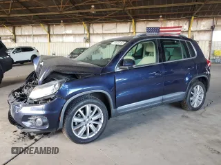 2015 Volkswagen Tiguan SEL with VIN WVGAV7AX7FW504752, listed as a Copart auction lot 45328155 with 123,031 mi miles and Salvage title. Bid and sale history available at DreamBid. Image 1.
