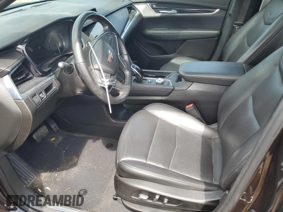2021 Cadillac XT5 FWD Premium Luxury with VIN 1GYKNCRS9MZ217560, listed as a Copart auction lot 60733295 with 52,242 mi miles and Salvage title. Bid and sale history available at DreamBid. Image 7.