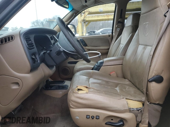 1999 Dodge Durango with VIN 1B4HS28Y3XF569044, listed as a Copart auction lot 44583815 with 70,682 mi miles and Salvage title. Bid and sale history available at DreamBid. Image 7.