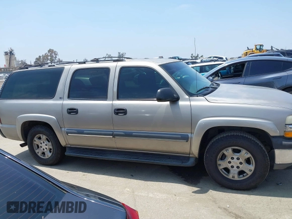 2002 Chevrolet Suburban LT z VIN 1GNFK16T92J208121, wystawiony jako IAAI lot #42163490 z przebiegiem 177 145 mil mil oraz . Historia ofert i sprzedaży dostępna na DreamBid. Obrazek 13.
