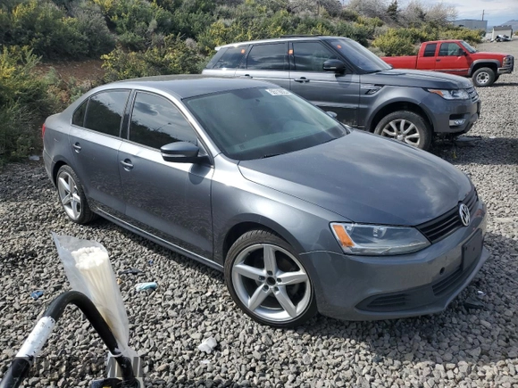 2012 Volkswagen Jetta SE with VIN 3VWDP7AJ2CM311442, listed as a Copart auction lot 55118825 with 124,478 mi miles and Salvage title. Bid and sale history available at DreamBid. Image 4.