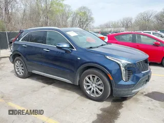 2021 Cadillac XT4 AWD Premium Luxury z VIN 1GYFZDR45MF048569, wystawiony jako IAAI lot #41902941 z przebiegiem 53 891 mil mil oraz . Historia ofert i sprzedaży dostępna na DreamBid. Obrazek 13.