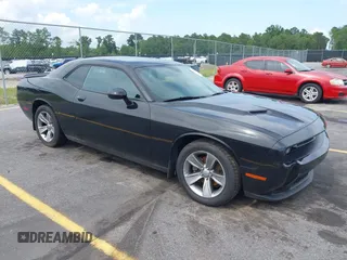 2019 Dodge Challenger SXT z VIN 2C3CDZAG9KH672207, wystawiony jako IAAI lot #42481134 z przebiegiem 175 466 mil mil oraz . Historia ofert i sprzedaży dostępna na DreamBid. Obrazek 1.