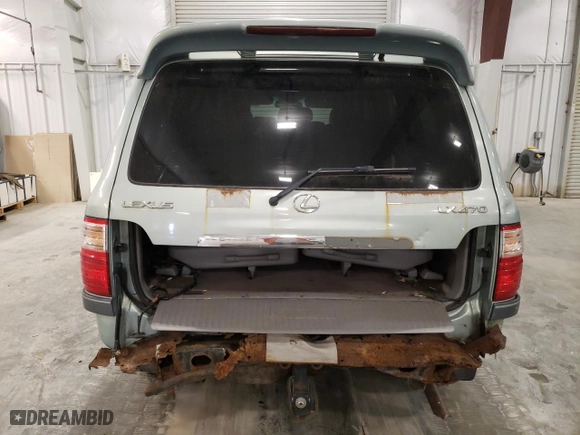 2004 Lexus LX 470 with VIN JTJHT00W843548361, listed as a Copart auction lot 76465204 with 257,543 mi miles and Salvage Title. Bid and sale history available at carsss.com. Image 6.