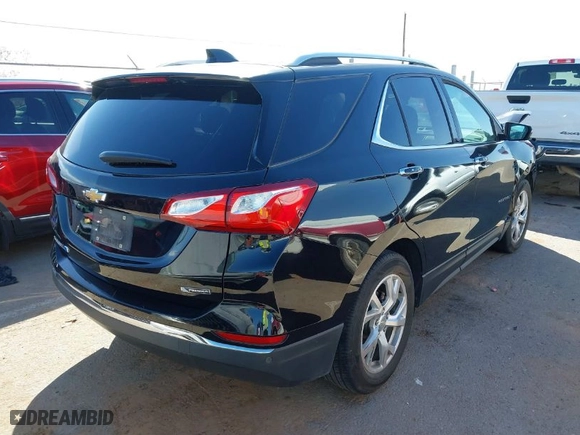 2018 Chevrolet Equinox Premier with VIN 3GNAXPEU5JL165915, listed as a IAAI auction lot 41597476 with 71,495 mi miles. Bid and sale history available at carsss.com. Image 4.