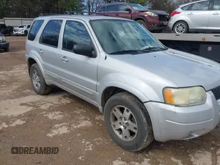 2004 Ford Escape Limited with VIN 1FMCU94104KB50513, listed as a IAAI auction lot 41720459 with 200,798 mi miles. Bid and sale history available at carsss.com. Image 6.
