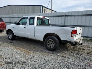 2010 Ford Ranger with VIN 1FTLR1EE1APA37032, listed as a Copart auction lot 82587614 with 215,440 mi miles and Salvage Title. Bid and sale history available at DreamBid. Image 2.