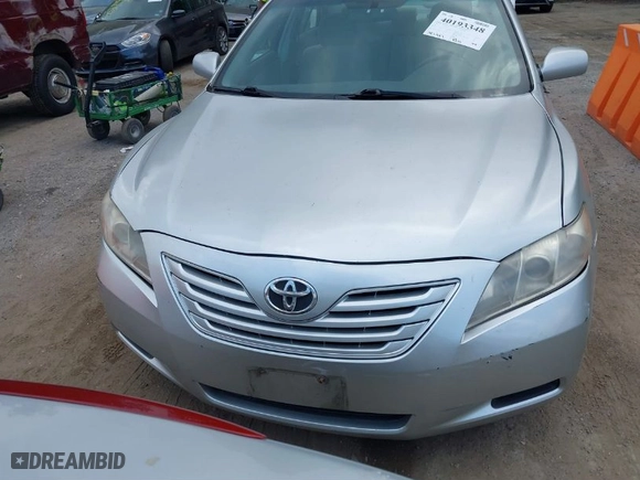 2007 Toyota Camry CE with VIN 4T1BE46K77U140703, listed as a IAAI auction lot 40193348 with 183,987 mi miles. Bid and sale history available at carsss.com. Image 12.
