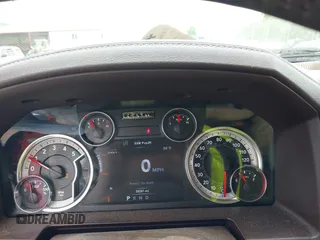 2015 Ram 1500 Laramie z VIN 1C6RR7JM8FS501701, wystawiony jako IAAI lot #42224424 z przebiegiem 59 591 mil mil oraz . Historia ofert i sprzedaży dostępna na DreamBid. Obrazek 7.