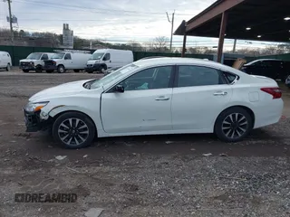 2018 Nissan Altima SR with VIN 1N4AL3APXJC283392, listed as a IAAI auction lot 41214643 with 126,720 mi miles and . Bid and sale history available at DreamBid. Image 14.