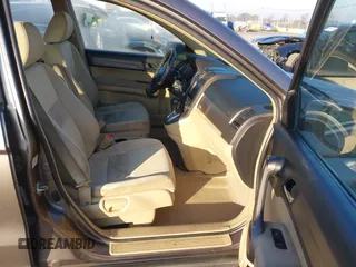 2009 Honda CR-V LX with VIN 5J6RE48389L011915, listed as a IAAI auction lot 41301796 with 214,807 mi miles. Bid and sale history available at carsss.com. Image 5.