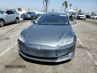 2014 Tesla Model S 60 z VIN 5YJSA1H17EFP36595, wystawiony jako Copart lot #53705035 z przebiegiem 148 254 mil mil oraz Szkoda całkowita • Salvage title. Historia ofert i sprzedaży dostępna na DreamBid. Obrazek 13.