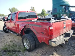 2008 Ford F-450 XL with VIN 1FTXW43R38EA49979, listed as a Copart auction lot 68886724 with 208,930 mi miles and Salvage Title. Bid and sale history available at carsss.com. Image 2.