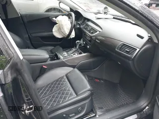 2014 Audi S7 Prestige with VIN WAUW2AFCXEN105101, listed as a IAAI auction lot 41562793 with 1 mi miles. Bid and sale history available at carsss.com. Image 5.