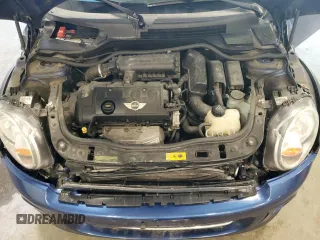 2013 MINI Hardtop with VIN WMWSU3C54DT686969, listed as a Copart auction lot 62160145 with 100,636 mi miles and Clean title. Bid and sale history available at DreamBid. Image 11.