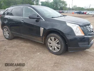 2013 Cadillac SRX with VIN 3GYFNAE39DS560242, listed as a IAAI auction lot 41965019 with 220,923 mi miles. Bid and sale history available at carsss.com. Image 1.