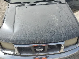 1999 Nissan Frontier XE z VIN 1N6ED26Y4XC344388, wystawiony jako Copart lot #75514124 z przebiegiem Nie podano mil oraz Szkoda całkowita • Salvage title. Historia ofert i sprzedaży dostępna na DreamBid. Obrazek 11.
