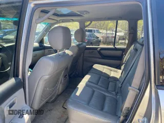 2004 Toyota Land Cruiser z VIN JTEHT05J542063838, wystawiony jako Copart lot #55477635 z przebiegiem 290 726 mil mil oraz Czysty tytuł • Clean title. Historia ofert i sprzedaży dostępna na DreamBid. Obrazek 6.
