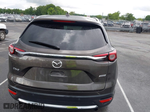 2016 Mazda CX-9 Grand Touring с VIN JM3TCADY6G0126391, выставлен на аукционе IAAI как лот 42242541 с пробегом 45 147 миль миль и . История ставок и продаж доступна на DreamBid. Изображение 16.