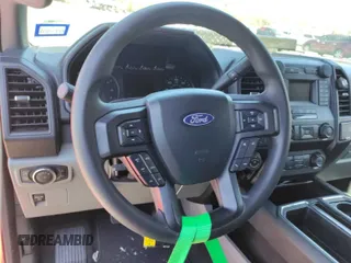2020 Ford F-150 XL with VIN 1FTEW1E41LKE81388, listed as a IAAI auction lot 42715664 with 113,099 mi miles and . Bid and sale history available at DreamBid. Image 12.