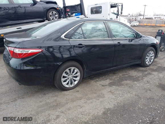 2015 Toyota Camry Hybrid LE with VIN 4T1BD1FK7FU163723, listed as a IAAI auction lot 41886718 with 432,925 mi miles. Bid and sale history available at carsss.com. Image 4.