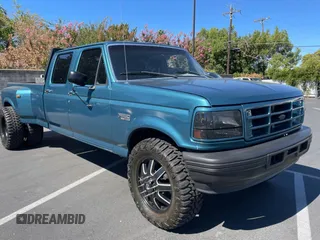 1994 Ford F-350 with VIN 1FTJW35F1REA51797, listed as a Copart auction lot 73572104 with 169,075 mi miles and Clean Title. Bid and sale history available at DreamBid. Image 1.