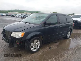 2013 Dodge Grand Caravan SE with VIN 2C4RDGBG8DR736291, listed as a IAAI auction lot 42161396 with Not Provided miles and . Bid and sale history available at DreamBid. Image 2.