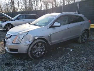 2014 Cadillac SRX Luxury Collection z VIN 3GYFNEE34ES641335, wystawiony jako Copart lot #47519325 z przebiegiem 124 407 mil mil oraz Szkody całkowita. Historia ofert i sprzedaży dostępna na DreamBid. Obrazek 1.