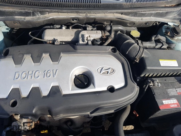 2007 Hyundai Accent GL z VIN KMHCN45C97U146808, wystawiony jako Copart lot #70781004 z przebiegiem Nie podano mil oraz Szkoda całkowita • Salvage title. Historia ofert i sprzedaży dostępna na DreamBid. Obrazek 11.