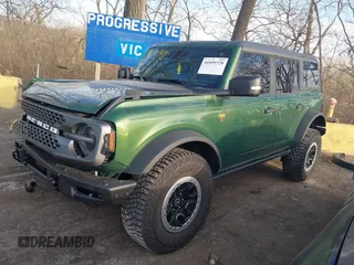 2023 Ford Bronco z VIN 1FMEE5DP2PLA95399, wystawiony jako IAAI lot #41899728 z przebiegiem 16 199 mil mil oraz . Historia ofert i sprzedaży dostępna na DreamBid. Obrazek 2.