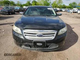 2012 Ford Taurus Limited z VIN 1FAHP2FW6CG136463, wystawiony jako Copart lot #57159005 z przebiegiem 124 833 mil mil oraz Szkoda całkowita • Salvage title. Historia ofert i sprzedaży dostępna na DreamBid. Obrazek 5.