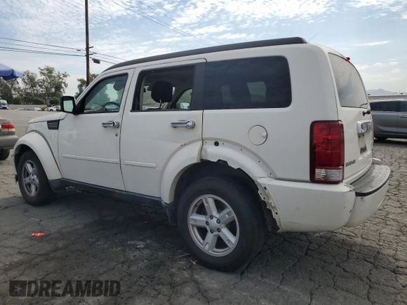 2010 Dodge Nitro SXT z VIN 1D4PT5GK8AW100343, wystawiony jako Copart lot #74628804 z przebiegiem 156 612 mil mil oraz Szkoda całkowita • Salvage title. Historia ofert i sprzedaży dostępna na DreamBid. Obrazek 2.