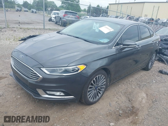 2017 Ford Fusion SE with VIN 3FA6P0T9XHR186017, listed as a IAAI auction lot 42535725 with 166,794 mi miles and . Bid and sale history available at DreamBid. Image 2.