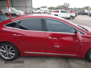 2015 Hyundai Azera with VIN KMHFG4JG1FA488009, listed as a IAAI auction lot 41864544 with 99,358 mi miles and . Bid and sale history available at carsss.com. Image 13.