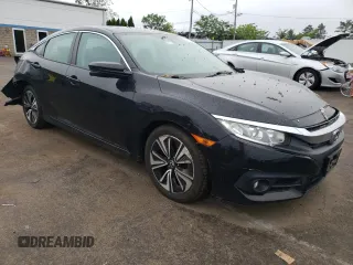 2017 Honda Civic EX-L with VIN 19XFC1F73HE201731, listed as a Copart auction lot 60104785 with 63,932 mi miles and Salvage title. Bid and sale history available at DreamBid. Image 4.