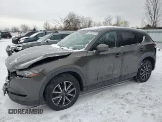 2018 Mazda CX-5 Grand Touring z VIN JM3KFBDM7J0321199, wystawiony jako Copart lot #83181834 z przebiegiem 143 641 mil mil oraz Szkoda całkowita • Salvage title. Historia ofert i sprzedaży dostępna na DreamBid. Obrazek 1.