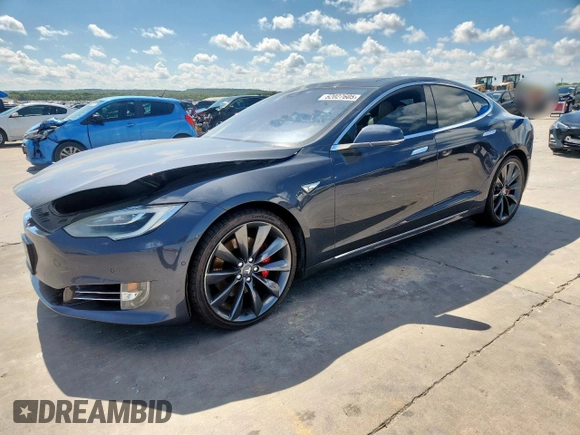 2016 Tesla Model S 90D z VIN 5YJSA1E40GF145137, wystawiony jako Copart lot #62027605 z przebiegiem 92 060 mil mil oraz Szkoda całkowita • Salvage title. Historia ofert i sprzedaży dostępna na DreamBid. Obrazek 1.